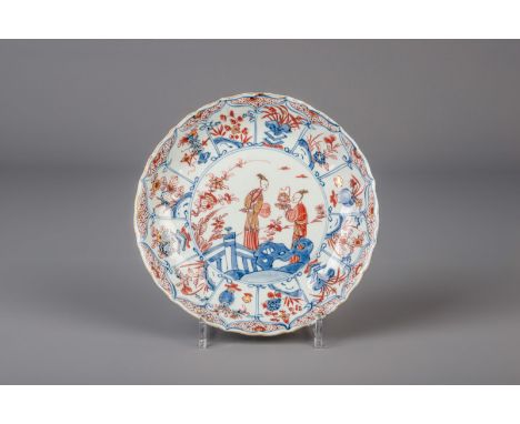 Title: A Chinese Imari style plate with figures in a landscape, Kangxi/Yongzheng Description: Dimensions:  Dia.: 22,1 cm   