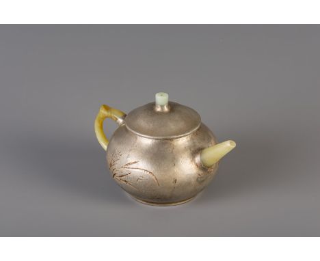 Title: A Chinese inscribed pewter encased Yixing stoneware teapot with jade, 20th C. Description: Dimensions:  H 9 - L 16,7 c