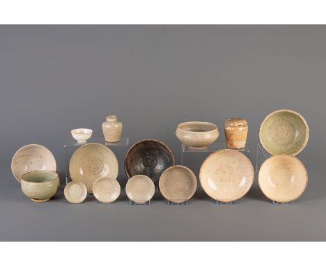 Title: A large collection Vietnamese monochrome glazed bowls, saucers, etc., some with underglaze design, Thanh Hoa, 9th/10th