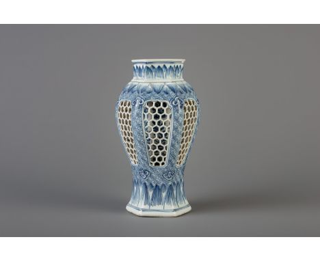 Title: A Chinese blue and white reticulated double walled vase, Kangxi Description: Dimensions:  H 22,2 cm   