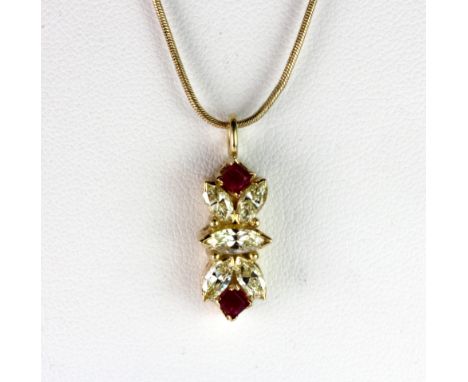 A yellow metal (tested 18ct gold) pendant set with fancy light yellow marquise cut diamonds (overall approx. 1.30ct) and prin