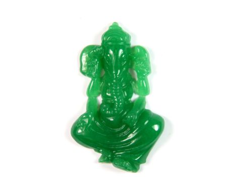 A carved green jade panel of Genesha, H. 5cm.