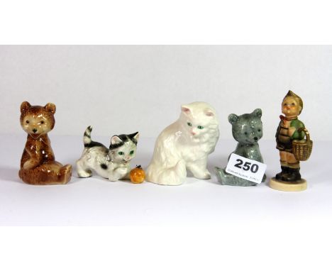 Five Hummel figures.