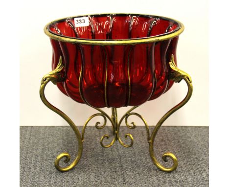 A gilt mounted metal ribbed ruby glass bowl, Dia. 30cm H. 32cm.