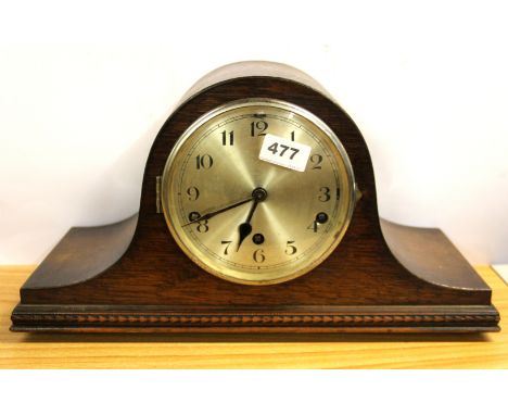An oak mantle clock.