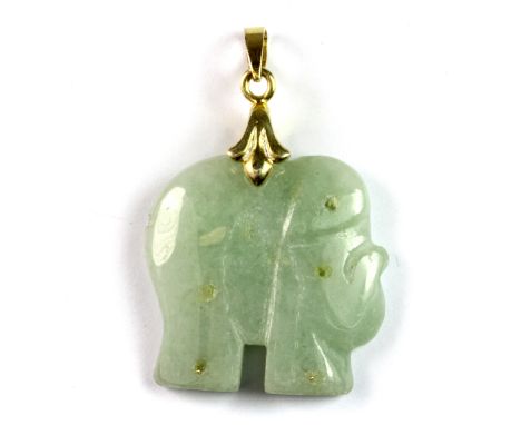 A yellow metal mounted carved jade elephant pendant, L. 4cm.