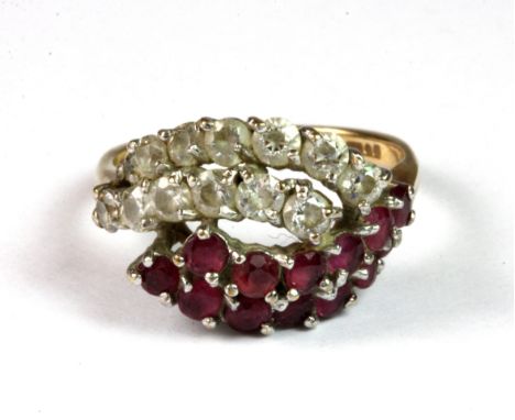 A 9ct yellow gold ruby and white stone set ring (K).