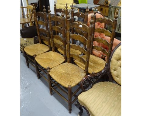 A set of 6 oak ladder-back and rush-seated dining chairs 