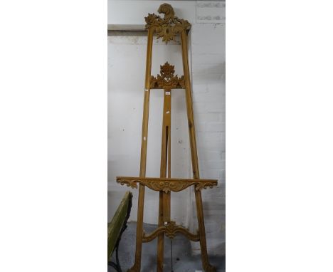 A reproduction carved hardwood folding artist's easel 