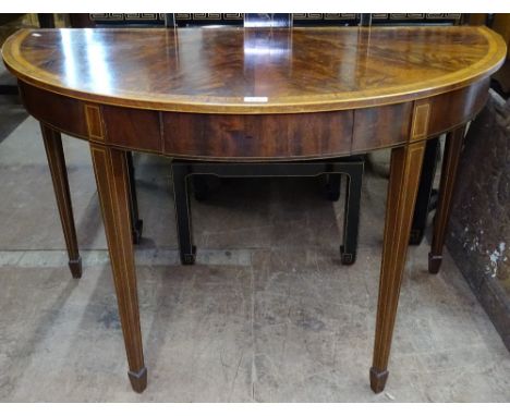 A Regency mahogany and satinwood banded demilune console table, raised on tapered legs and spade feet, W118cm 