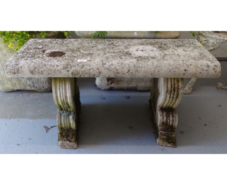 An stonemason carved stone 3 section garden bench w92cm, 