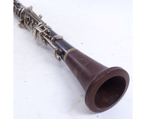A Vintage Boosey &amp; Hawkes rosewood 77 clarinet, serial no. 168250, overall length 67cm, in hardshell canvas case 