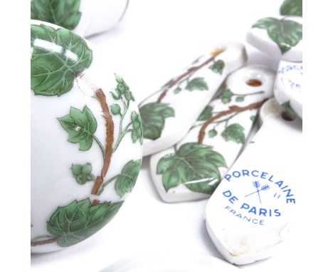 Various Vintage Porcelaine de Paris ceramic door furniture, including finger plates, knobs and keyhole covers 