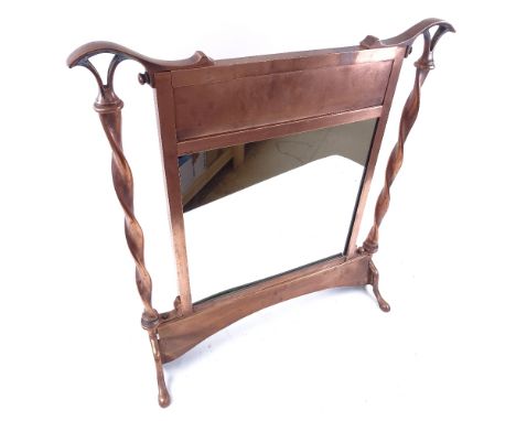 A double-sided mirrored copper-framed fire screen, height 54cm 