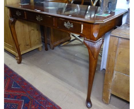 A reproduction mahogany console table with 3 frieze drawers, on cabriole legs, W122cm 