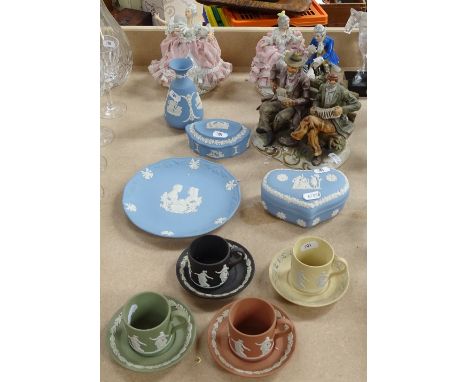 Wedgwood Jasperware coffee cans and saucers, boxes, and 3 Continental figures 