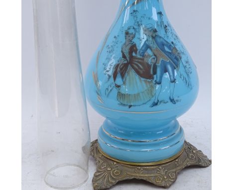 A stencilled blue glass brass Duplex oil lamp, height excluding chimney 57cm 