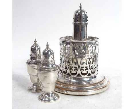 A pair of Goram sterling silver peppers, a silver sugar caster, Birmingham 1930, and a silver plated siphon stand (4) 