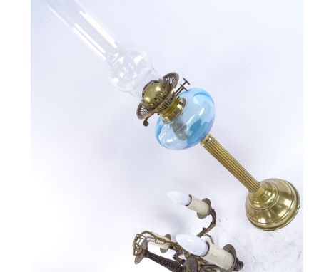 A brass oil lamp with blue glass font, and a 5-branch hanging chandelier, lamp height excluding chimney 47cm (2) 