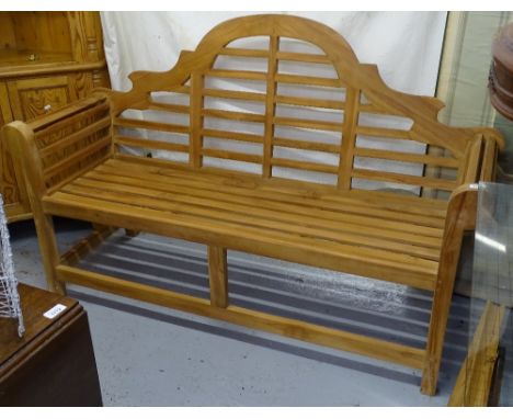 A slatted teak Lutyens design garden bench 