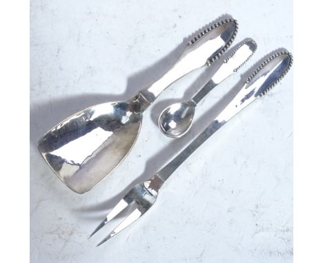 A Georg Jensen Danish silver Kugle beaded caddy spoon, matching salt spoon and pickle fork (3) 