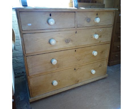 A Victorian pine 5-drawer chest with ceramic handles, W105cm, and a small 3-tier open bookcase, W51cm 