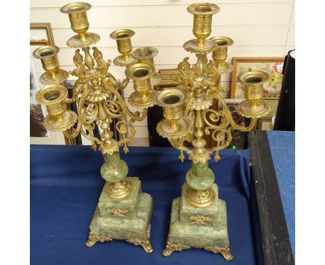 A pair of green onyx and brass 5-light candelabra, height 50cm 