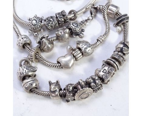 28 Pandora silver charms on 3 unnamed sterling silver bracelets 