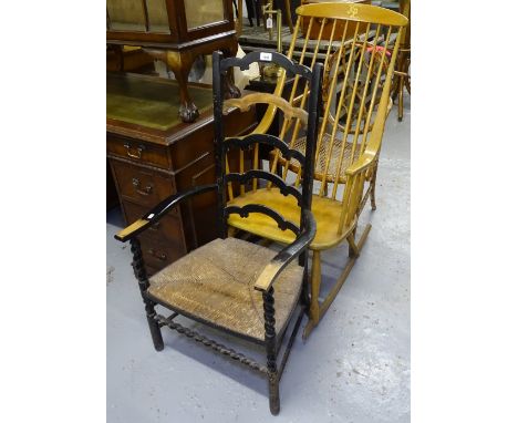 An ebonised ladder-back armchair, a beech rocking chair, and a bamboo elbow chair 