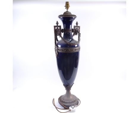 A large Royal Blue ceramic urn lamp, brass swag mounts with laurel wreath base, height excluding fitting 77cm 