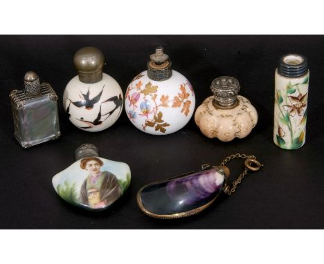 Mixed Lot: scent bottles to include a hand painted porcelain bottle of shield shape, the front decorated with a lady, screw o