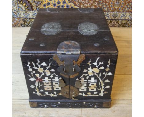 CHINESE JEWELLERY BOX, 19th Century hardwood, opening to reveal a mirror and drawers with mother of pearl foliate inlay and m