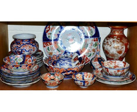 A group of  Imari Porcelain including plates, bowls, vases, etc (one shelf)