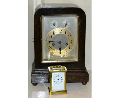 A brass carriage timepiece; and a German mantel clock (2) 