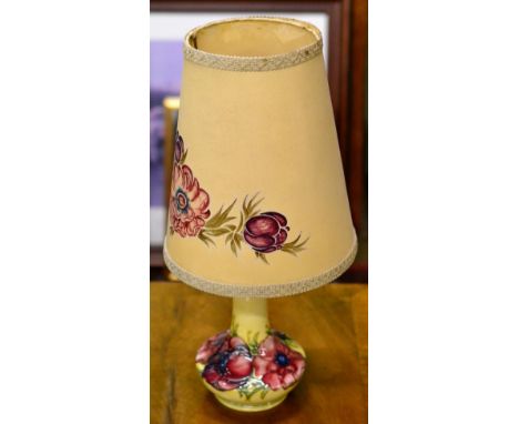 A Walter Moorcroft Anemone table lamp with original painted shade 