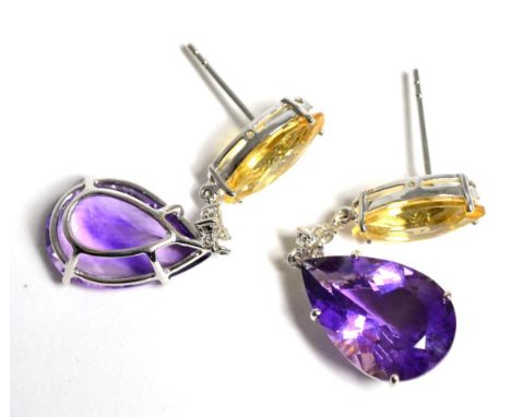 A pair of amethyst, citrine and diamond earrings, a marquise cut citrine suspends a cluster of three round brilliant cut diam