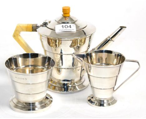 An Art Deco silver three piece tea service, Viners Ltd 