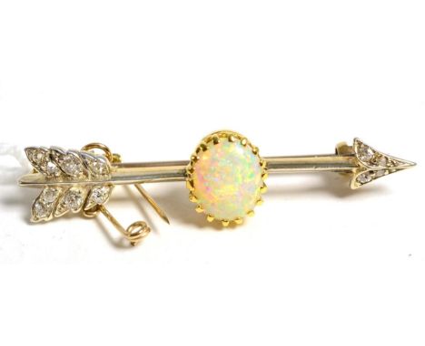 An early twentieth century opal and diamond arrow brooch, an oval opal to a diamond set arrow, total estimated diamond weight