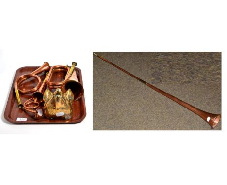 A Mayers &amp; Harrison brass and copper bugle; a brass and copper coaching horn; three assorted brass and copper hunting hor