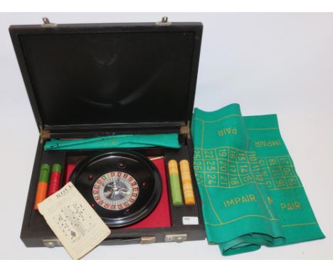 K&amp;C Ltd roulette wheel with chips and playing baize, in fitted  case, wheel D25cm 