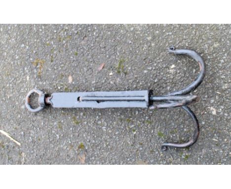 Cast iron pan hooks, a chain dog collar and a fleem 
