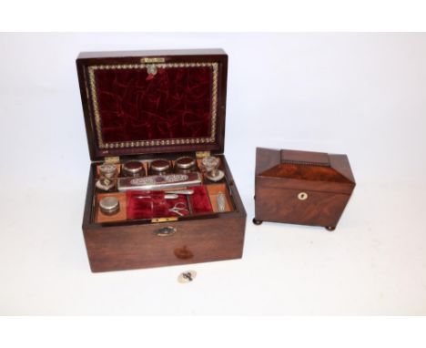 C19th mahogany fitted travelling vanity box with fitted interior, L30cm; and a mahogany sarcophagus two-compartment tea caddy