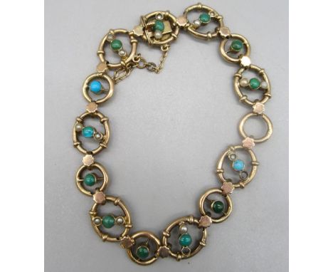 9ct yellow gold bracelet set with blue and green stones and seed pearls (two pearls missing), with box clasp and safety chain