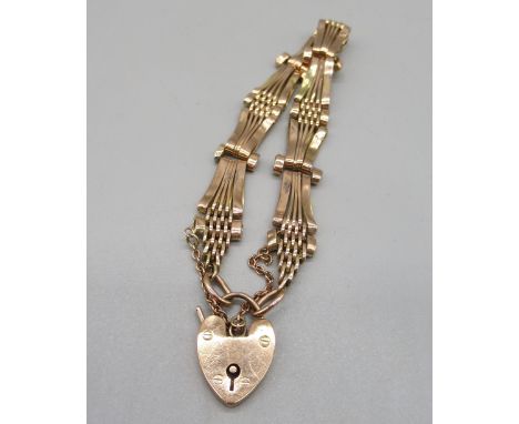 9ct yellow gold bar gate bracelet with padlock clasp and safety chain, stamped 375, 15.6g 