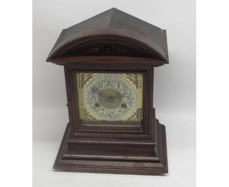 Junghans - early C20th oak arched top mantle clock, bevelled glazed panel door enclosing brass dial with applied silvered Ara