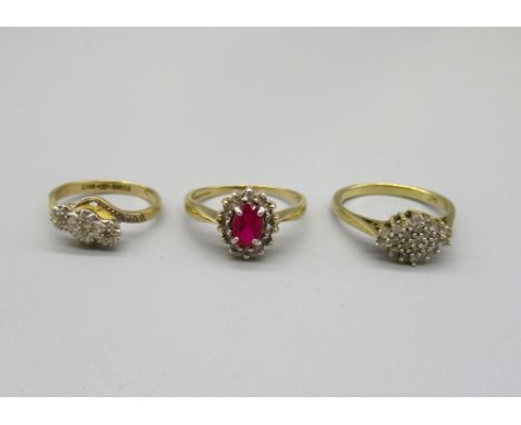 9ct yellow gold diamond and ruby cluster ring, size M1/2, stamped 375, a 9ct gold and platinum, three stone diamond ring, sta