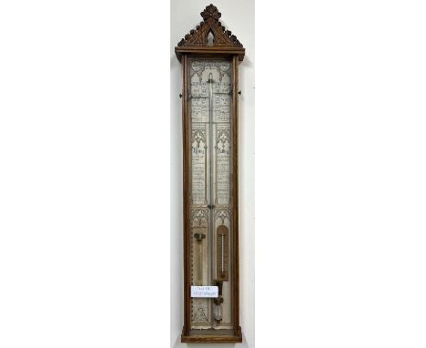 Late C19th oak Admiral Fitzroy's Barometer, carved gothic case enclosing paper register no. 367815, barometer, thermometer an