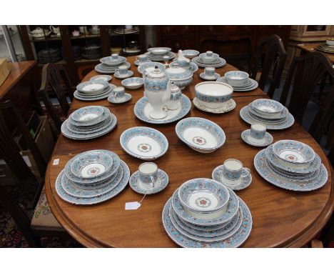 A WEDGEWOOD FLORENTINE PATTERNED PORCELAIN PART DINNER SERVICE decorated with classical motifs in turquoise enamel to include