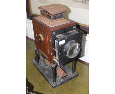 W. WATSON &amp; SONS MAHOGANY AND LACQUERED BRASS PROJECTOR on stand the front plate marked with the makers name and 313, Hig