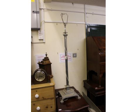 A SILVER PLATED STANDARD LAMP of Corinthian column form, standing on square section base and terminating in paw feet, approxi